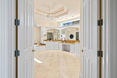 This meticulously maintained, custom-built Dan Najjar Sterling on University Park Country Club in Florida - for sale on GolfHomes.com, golf home, golf lot