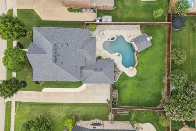 Nestled on a quiet cul-de-sac in the highly sought-after golf on Trophy Club of Dallas in Texas - for sale on GolfHomes.com, golf home, golf lot