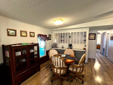 Discover the charm of this exceptional property, featuring:    - on Lake Henry Golf Club in Florida - for sale on GolfHomes.com, golf home, golf lot