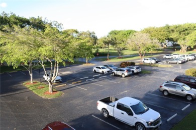 Beautiful, clean 2 Bed Room 2 Bath Condo. Corner unit centrally on Oriole Golf and Tennis Club in Florida - for sale on GolfHomes.com, golf home, golf lot