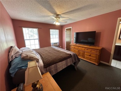 Discover this affordable Citrus Springs home, ideally located on Citrus Springs Country Club in Florida - for sale on GolfHomes.com, golf home, golf lot