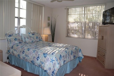 Beautiful, clean 2 Bed Room 2 Bath Condo. Corner unit centrally on Oriole Golf and Tennis Club in Florida - for sale on GolfHomes.com, golf home, golf lot