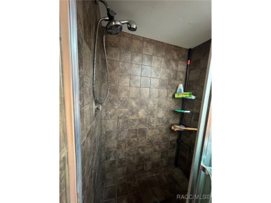 Discover this affordable Citrus Springs home, ideally located on Citrus Springs Country Club in Florida - for sale on GolfHomes.com, golf home, golf lot