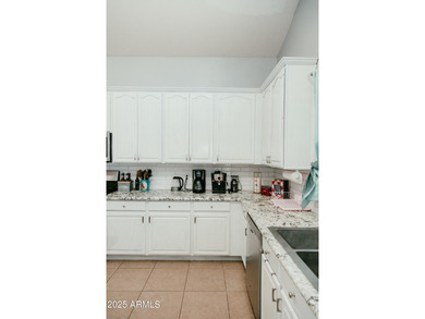 Looking for a semi-custom 2-story home located in an upscale on Dave White Reg Park and Golf Course in Arizona - for sale on GolfHomes.com, golf home, golf lot