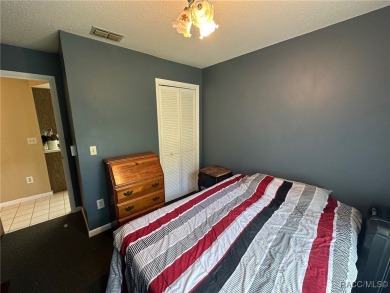 Discover this affordable Citrus Springs home, ideally located on Citrus Springs Country Club in Florida - for sale on GolfHomes.com, golf home, golf lot