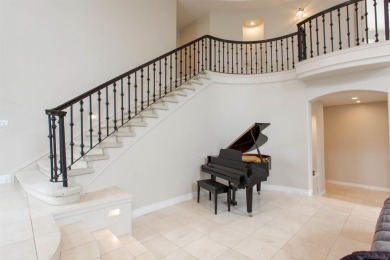 Step into timeless elegance with this custom-built executive on Four Seasons Resort Aviara Golf Club in California - for sale on GolfHomes.com, golf home, golf lot