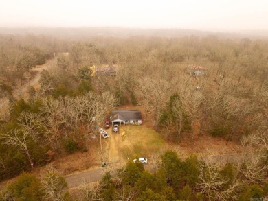 Discover the charm of this 2-bedroom, 1-bath home in the on Cherokee Village North Course in Arkansas - for sale on GolfHomes.com, golf home, golf lot