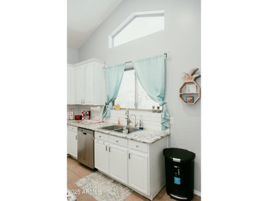 Looking for a semi-custom 2-story home located in an upscale on Dave White Reg Park and Golf Course in Arizona - for sale on GolfHomes.com, golf home, golf lot