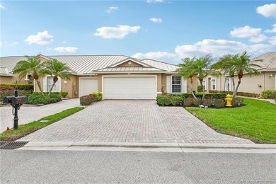 Enjoy stunning golf course and pond views from the expansive on Eagle Marsh Golf Club in Florida - for sale on GolfHomes.com, golf home, golf lot