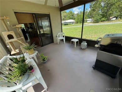 Discover this affordable Citrus Springs home, ideally located on Citrus Springs Country Club in Florida - for sale on GolfHomes.com, golf home, golf lot