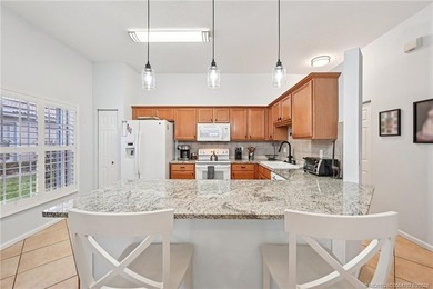 Enjoy stunning golf course and pond views from the expansive on Eagle Marsh Golf Club in Florida - for sale on GolfHomes.com, golf home, golf lot