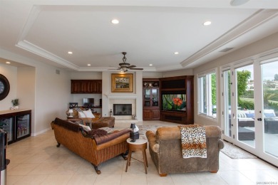 Step into timeless elegance with this custom-built executive on Four Seasons Resort Aviara Golf Club in California - for sale on GolfHomes.com, golf home, golf lot