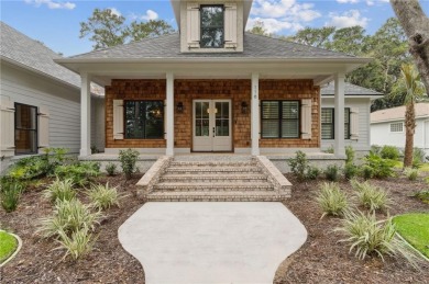 Experience refined luxury and exceptional design! Situated on on The King and Prince Golf Course, Home of the Hampton Club in Georgia - for sale on GolfHomes.com, golf home, golf lot