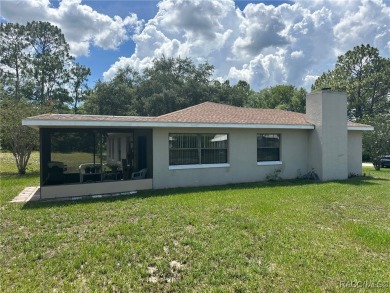 Discover this affordable Citrus Springs home, ideally located on Citrus Springs Country Club in Florida - for sale on GolfHomes.com, golf home, golf lot