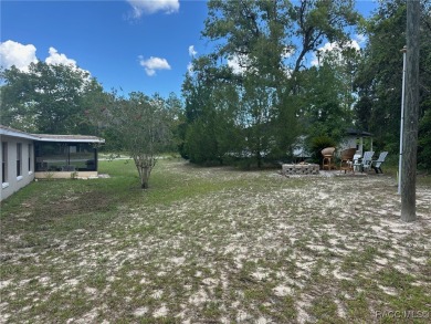 Discover this affordable Citrus Springs home, ideally located on Citrus Springs Country Club in Florida - for sale on GolfHomes.com, golf home, golf lot