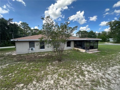 Discover this affordable Citrus Springs home, ideally located on Citrus Springs Country Club in Florida - for sale on GolfHomes.com, golf home, golf lot