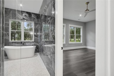 Experience refined luxury and exceptional design! Situated on on The King and Prince Golf Course, Home of the Hampton Club in Georgia - for sale on GolfHomes.com, golf home, golf lot