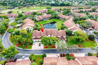 Look at this beautiful first-floor condo with a private garage on Boca Pointe Country Club in Florida - for sale on GolfHomes.com, golf home, golf lot
