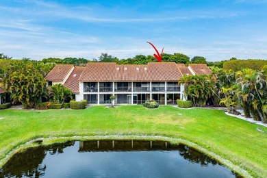 Look at this beautiful first-floor condo with a private garage on Boca Pointe Country Club in Florida - for sale on GolfHomes.com, golf home, golf lot