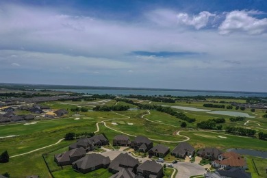 Spacious and stunning, this 4,130 sq. ft. home offers 5 bedrooms on Heath Golf and Yacht Club in Texas - for sale on GolfHomes.com, golf home, golf lot