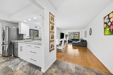 Look at this beautiful first-floor condo with a private garage on Boca Pointe Country Club in Florida - for sale on GolfHomes.com, golf home, golf lot