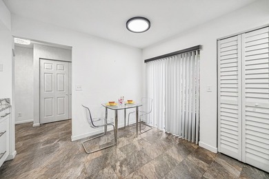 Look at this beautiful first-floor condo with a private garage on Boca Pointe Country Club in Florida - for sale on GolfHomes.com, golf home, golf lot