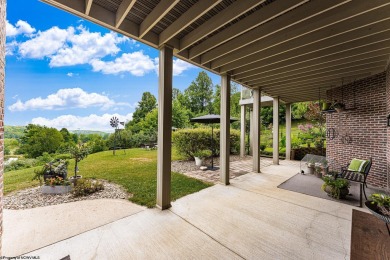 Welcome to your dream home! This magnificent brick residence is on Mountaineer Golf and Country Club in West Virginia - for sale on GolfHomes.com, golf home, golf lot