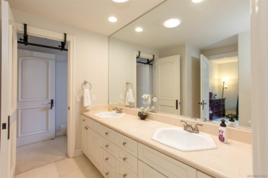 Step into timeless elegance with this custom-built executive on Four Seasons Resort Aviara Golf Club in California - for sale on GolfHomes.com, golf home, golf lot
