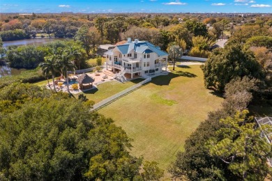 Nestled within the esteemed golf course community of Seminole on Seminole Lake Country Club in Florida - for sale on GolfHomes.com, golf home, golf lot