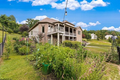 Welcome to your dream home! This magnificent brick residence is on Mountaineer Golf and Country Club in West Virginia - for sale on GolfHomes.com, golf home, golf lot