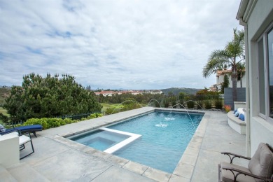 Step into timeless elegance with this custom-built executive on Four Seasons Resort Aviara Golf Club in California - for sale on GolfHomes.com, golf home, golf lot