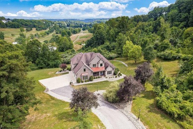 Welcome to your dream home! This magnificent brick residence is on Mountaineer Golf and Country Club in West Virginia - for sale on GolfHomes.com, golf home, golf lot