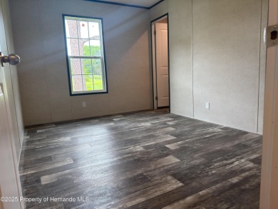 Welcome to this breathtaking, open-concept Modern home built on Brookridge Country Club in Florida - for sale on GolfHomes.com, golf home, golf lot