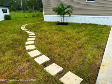 Welcome to this breathtaking, open-concept Modern home built on Brookridge Country Club in Florida - for sale on GolfHomes.com, golf home, golf lot