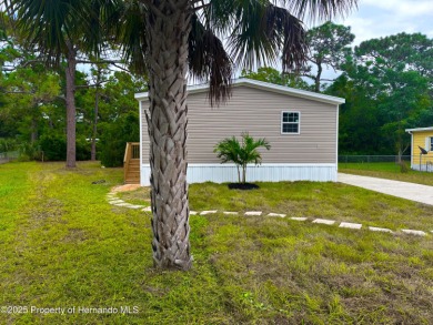 Welcome to this breathtaking, open-concept Modern home built on Brookridge Country Club in Florida - for sale on GolfHomes.com, golf home, golf lot