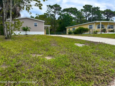 Welcome to this breathtaking, open-concept Modern home built on Brookridge Country Club in Florida - for sale on GolfHomes.com, golf home, golf lot