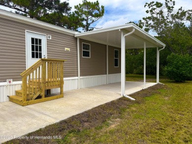 Welcome to this breathtaking, open-concept Modern home built on Brookridge Country Club in Florida - for sale on GolfHomes.com, golf home, golf lot