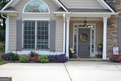 IMMACULATE RANCH HOME WITH FENCED BACKYARD! COVERED FRONT DOOR on The Frog Golf Club in Georgia - for sale on GolfHomes.com, golf home, golf lot