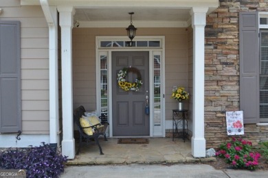 IMMACULATE RANCH HOME WITH FENCED BACKYARD! COVERED FRONT DOOR on The Frog Golf Club in Georgia - for sale on GolfHomes.com, golf home, golf lot