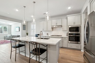 Enjoy panoramic mountain views and Phoenix skyline sunrises from on Verrado Golf Club  in Arizona - for sale on GolfHomes.com, golf home, golf lot