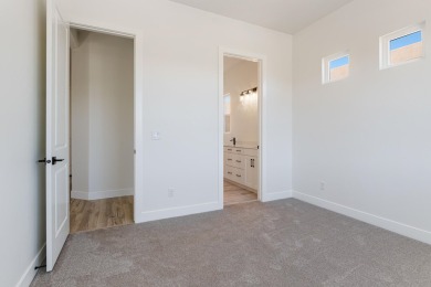 Discover pure comfort in this 4-bed, 4-bath retreat. With 2,554 on Sand Hollow Golf Resort in Utah - for sale on GolfHomes.com, golf home, golf lot