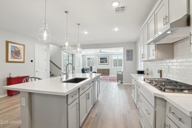 Enjoy panoramic mountain views and Phoenix skyline sunrises from on Verrado Golf Club  in Arizona - for sale on GolfHomes.com, golf home, golf lot