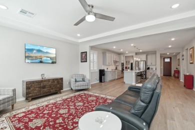 Enjoy panoramic mountain views and Phoenix skyline sunrises from on Verrado Golf Club  in Arizona - for sale on GolfHomes.com, golf home, golf lot