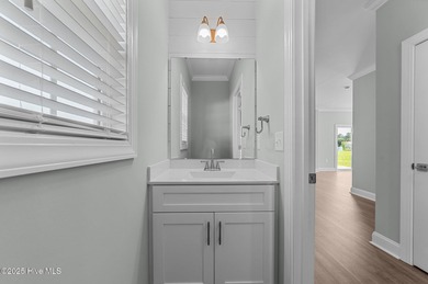 Designed with family living in mind, this home has a thoughtful on Ayden Golf and Country Club in North Carolina - for sale on GolfHomes.com, golf home, golf lot