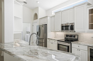 Nestled in Village Oaks of Grand Haven, this Mediterranean style on Grand Haven Golf Club in Florida - for sale on GolfHomes.com, golf home, golf lot