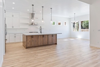 Discover pure comfort in this 4-bed, 4-bath retreat. With 2,554 on Sand Hollow Golf Resort in Utah - for sale on GolfHomes.com, golf home, golf lot