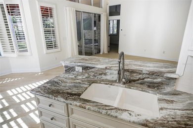 Nestled in Village Oaks of Grand Haven, this Mediterranean style on Grand Haven Golf Club in Florida - for sale on GolfHomes.com, golf home, golf lot