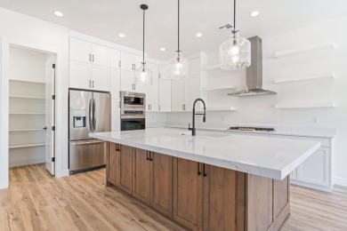 Discover pure comfort in this 4-bed, 4-bath retreat. With 2,554 on Sand Hollow Golf Resort in Utah - for sale on GolfHomes.com, golf home, golf lot