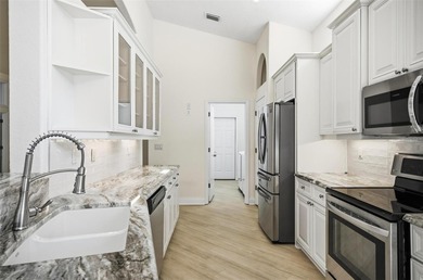 Nestled in Village Oaks of Grand Haven, this Mediterranean style on Grand Haven Golf Club in Florida - for sale on GolfHomes.com, golf home, golf lot