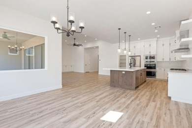 Discover pure comfort in this 4-bed, 4-bath retreat. With 2,554 on Sand Hollow Golf Resort in Utah - for sale on GolfHomes.com, golf home, golf lot